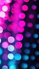 Obraz premium Pionowe ujęcie kolorowych świateł bokeh tworzących magiczną atmosferę z neonowym różem i niebieskimi akcentami na głębokim czarnym tle.
