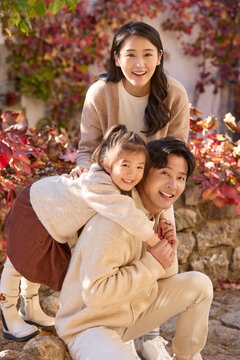 Lovely young family enjoying their trip together