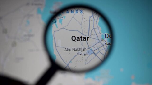 Map of Qatar seen through magnifying glass highlighting Gulf geopolitics, LNG, LPG and petroleum exports, crude routes via Strait of Hormuz amid Iran war tensions involving USA, Israel, energy.