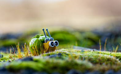 Obraz premium lego snail in outdoors