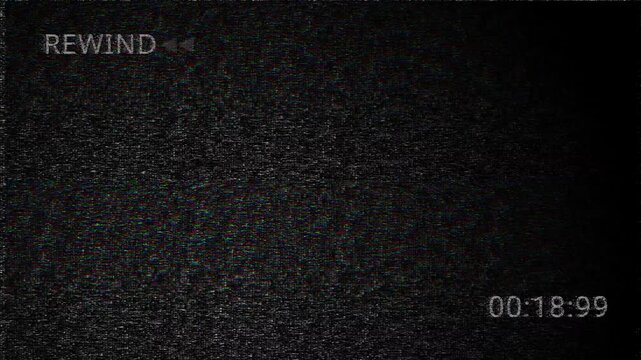 Gritty Vintage VHS defects noise. 4K analog VCR rewind arrows with chromatic aberration. Cinematic magnetic tape damage for professional video edits