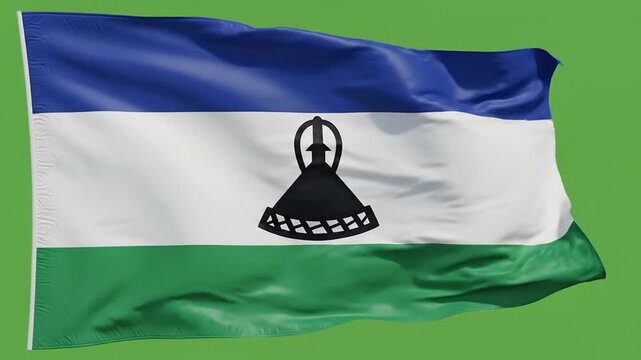 Realistic animation of the Lesotho flag waving smoothly against a green screen background