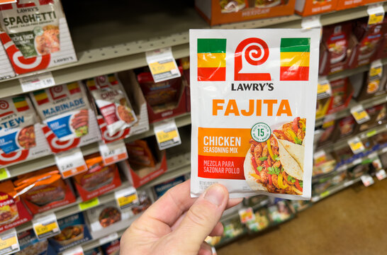 Lawry&rsquo;s Fajita Chicken Seasoning Packet Held In Hand In Grocery Store Spice Aisle