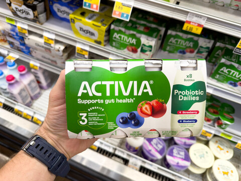 Activia Probiotic Dailies Yogurt Drink Pack Held In Hand In Grocery Store Dairy Aisle