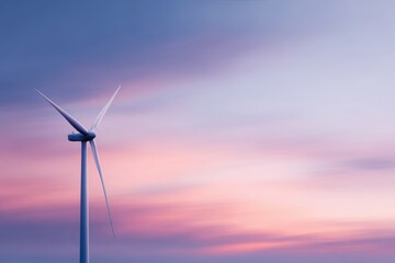 Obraz premium wind turbine on lakeshore during colorful sunset representing clean wind energy production