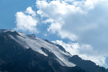 Close view of the permanent snow and ice on the high altitude peaks of Zailiysky Alatau.