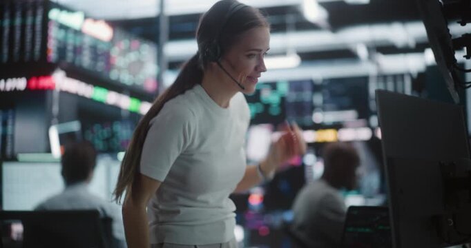 Happy Female Analyst Cheering For Stock Market Recovery and Asset Growth. Seeing Positive Trend on Analytical Dashboard, Woman Celebrates Profit Gains. Successful Professional in Digital Exchange Hub.
