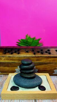 Stacked Zen Stones Balance with Wooden Tray Spa Still Life Meditation Relaxation Wellness Background Pink Aesthetic Calm Mindfulness Harmony Minimal Peaceful Ambient Video
