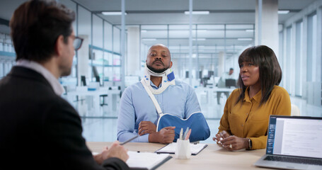 In A Busy Office, A Lawyer Helps An Injured Worker File Disability Claims