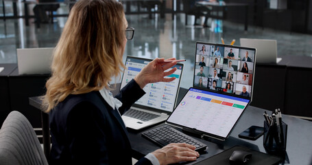 Naklejka na ściany i meble Expert Woman Hosts Live Virtual Training