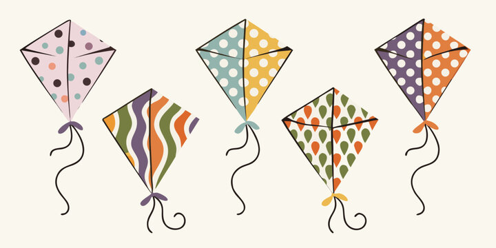 A collection of colorful diamond shaped kites against a soft background