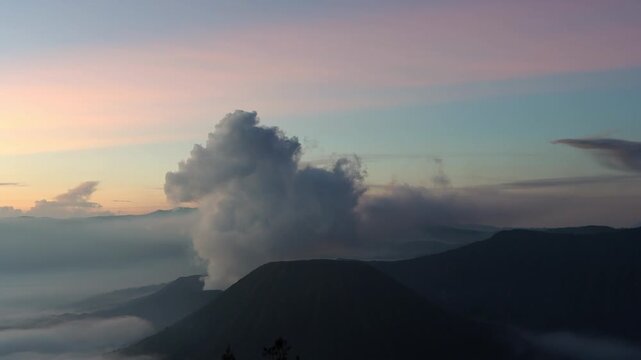 Gunung Batok Cinder Cone with Mount Bromo Eruption at Sunrise | King Kong Hill, East Java, Indonesia