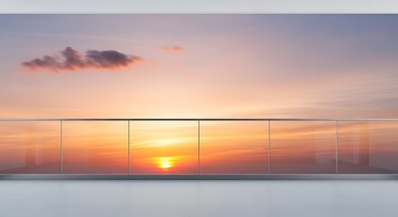 Fototapeta premium Modern balcony with glass railing overlooking a beautiful sunset