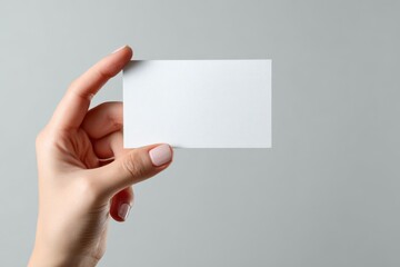 Obraz premium Creative blank card held by a gentle hand