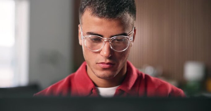 Review, glasses or journalist in office with laptop, draft edit or source feedback in article update. Reading, specs or man in agency with tech, fact check or industry research for online publication