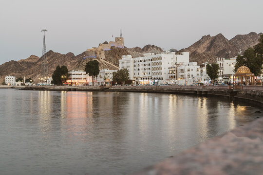 View of Mutrah fort and corniche in the evening, Muscat, Oman