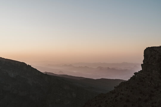 View of Oman desert at sunrise from Jebel Shams