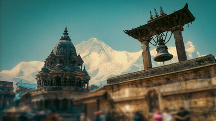 Ancient Patan Durbar Square Temples with Snowy Himalayas Background with copy space © Aliaksei