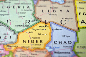 Naklejka premium Madama Niger on World Map with Blurred Background – Geography Location Concept