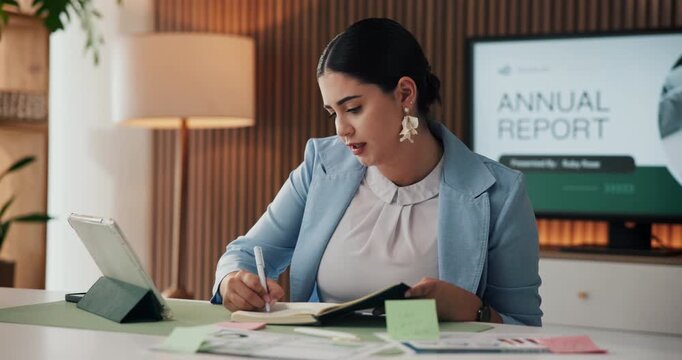 Woman, tablet and writing in notebook in office for stock price info, data comparison or forecasting. Financial analyst, tech or graph documents with sticky note for reporting, budget review or stats