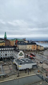 Stockholm, Sweden, 02.27.2026. Stockholm cityscape from above.
Aerial view of Stockholm, Slussen with historic buildings, water, and urban structure under cloudy sky.