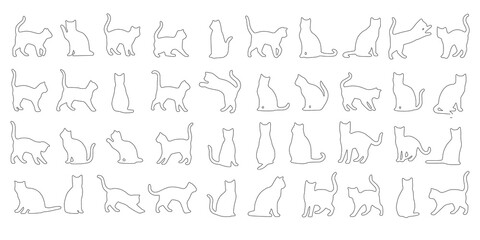 Obraz premium Hand-drawn outline cats posing on white 