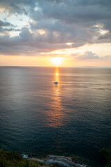 Fototapeta premium Minimal sunset with golden reflection at Promthep Cape Phuket Thailand
