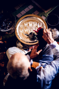 Senior man in Smara refugee camp preparing tea, Tindouf, Algeria