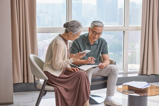 Senior couple handling the family budget