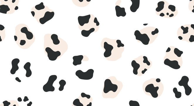 Seamless animal print pattern featuring black and beige leopard spots on a clean white background for fashion and textiles.