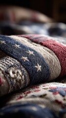 Fototapeta premium Folded flag quilt showing embroidered stars in close up