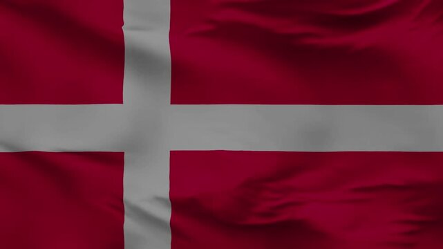 Danish Flag in Gentle Waves: a close-up shot of the Danish flag, the Dannebrog, billowing gracefully in the wind, its colors rich and vibrant against the light.