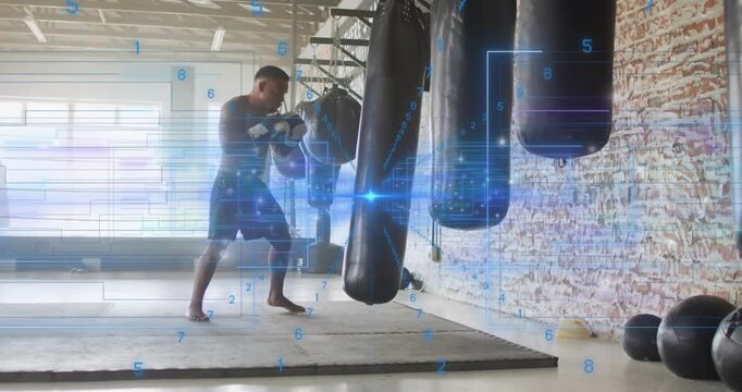 Male boxer training, stepping forward and landing jabs on heavy bag while HUD tracking power