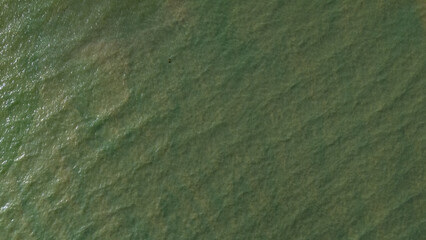 Top down aerial turquoise sea water texture © Andrew