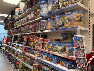 Naklejka premium Lego sets displayed on toy store shelves