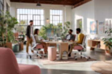 Fototapeta premium Blurred Diverse team collaborating in modern office with natural light