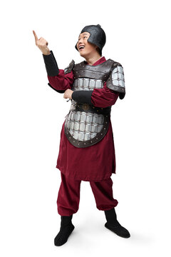 Humorous studio shot: armored ancient soldier