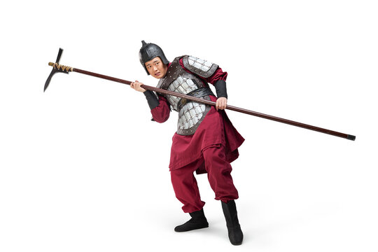 Humorous studio shot: armored ancient soldier