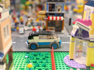 Naklejka premium Lego toy car on city street