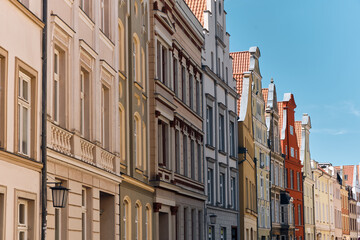 Obraz premium Historic Preservation And Urban Heritage Row Of Colorful Old Buildings In Stralsund Germany Architectural Detail And Cityscape Travel Destination And Cultural Landmark
