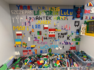 Naklejka premium Lego name wall with bins