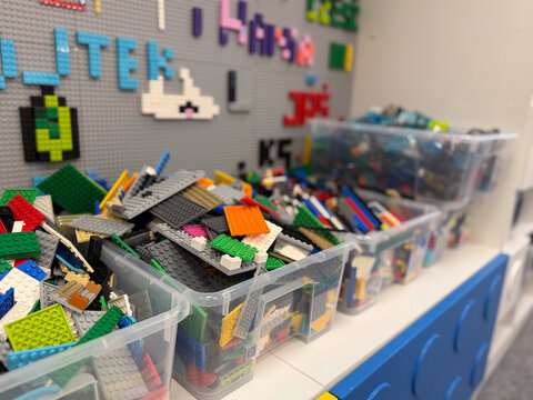 Bins of colorful lego plates and bricks