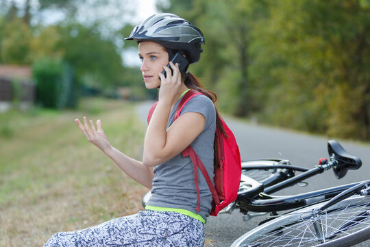 girl that has bike accident calling on the phone