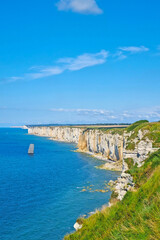 Fototapeta premium Scenic Coastal Cliffs Overlooking Azure Waters in Summer