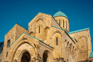 Fototapeta premium View on the Bagrati Cathedral with the end of the afternoon light, in Kutaisi, Georgia