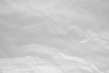 Obraz premium Crumpled White Plastic Sheet Texture Background