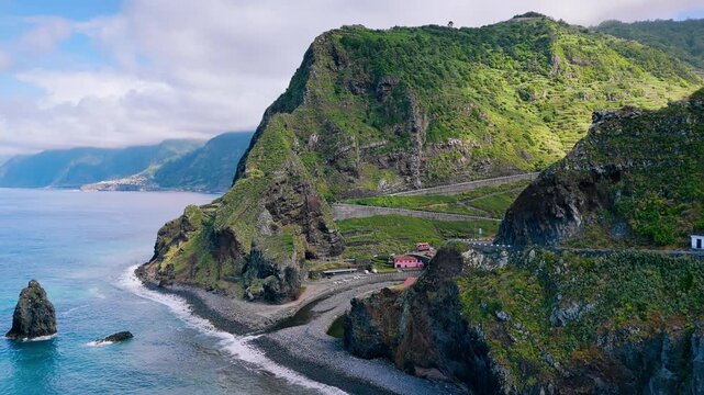 Mountain valley and coastal road infrastructure in Ribeira da Janela, northern Madeira, Portugal