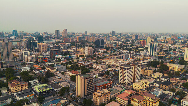 Aerial view of buildings and houses blending together in the skyline, creating a captivating urban tapestry, Lagos, Lagos, Nigeria.