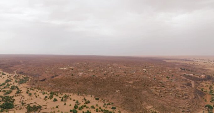 Aerial View Of Historic Desert Town Of Ouadane In Adrar Plateau Of Mauritania At Sunrise.