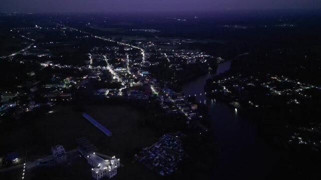 Night view overlooking Ternate and nearby Maragondon Cavite as town lights glow beneath the dark tropical sky.